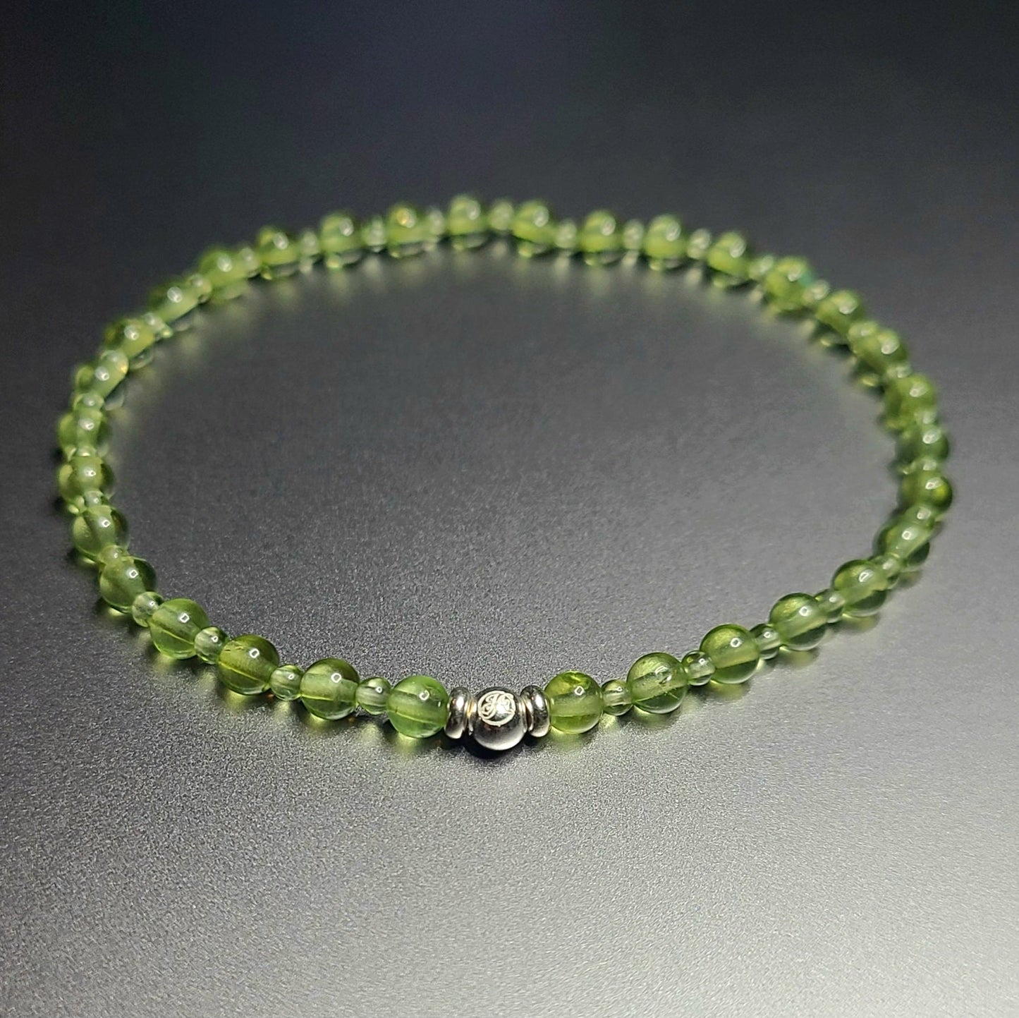 August Peridot and Sterling Silver V2 bracelet with alternating 2 mm and 4 mm peridot beads
