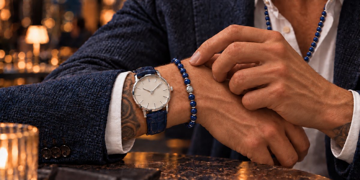 Man wearing the John Alex Sapphire Signature bracelet with a coordinating watch during an elegant evening out