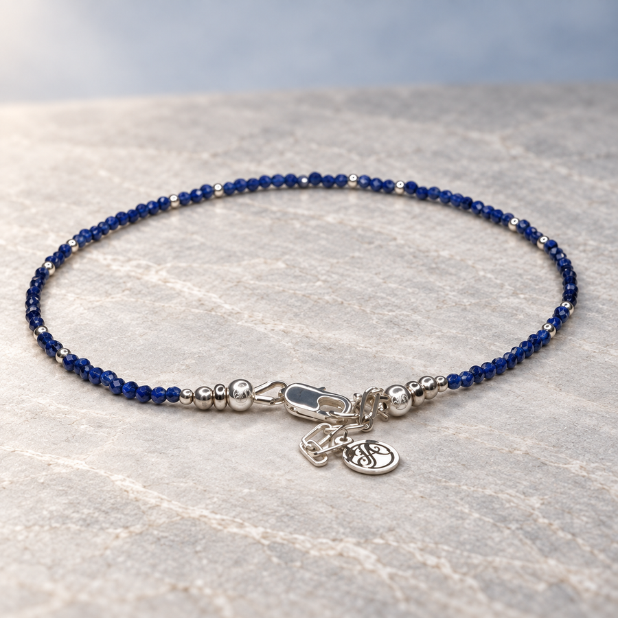 Sapphire Celeste sterling silver bracelet on a neutral stone surface
